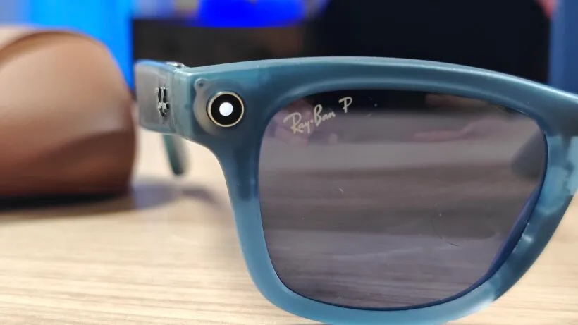 Close-up of a Ray-Ban Meta temple showing the camera and the white recording-indicator light
